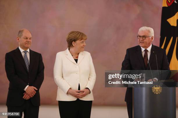 Germany Chancellor Angela Merkel stands near finance Ministry and vice Chancellor, Olaf Scholz and IGerman President Frank-Walter Steinmeier as she...