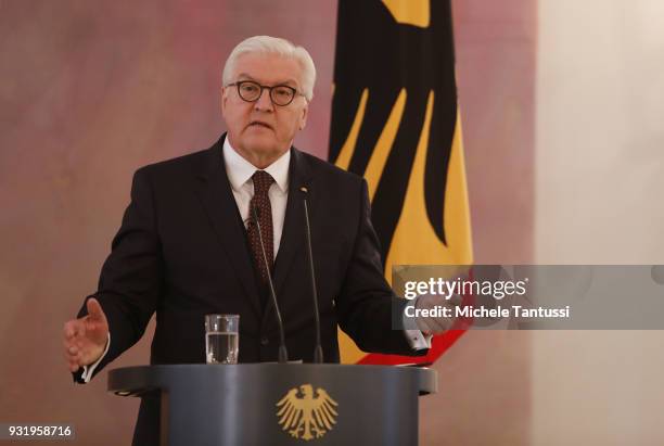 German President Frank-Walter Steinmeier speaks during a ceremony to confirm the members of the new German government cabinet at Schloss Bellevue...
