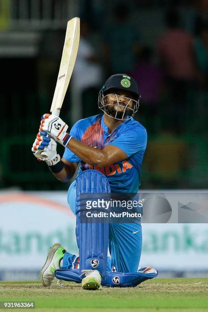 Indian cricketer Suresh Raina plays a shot during the 5th Twenty-20 cricket match of NIDAHAS Trophy between Bangladesh and India at R Premadasa...