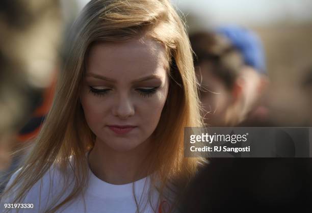 Kaylee Tyner, 16 a students at Columbine High School walks out of classes in protest of gun violence for 17 minutes, one minute for each Florida high...