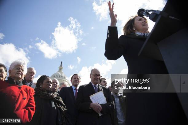 House Minority Leader Nancy Pelosi, a Democrat from California, right, speaks to student as Senate Minority Leader Chuck Schumer, a Democrat from New...