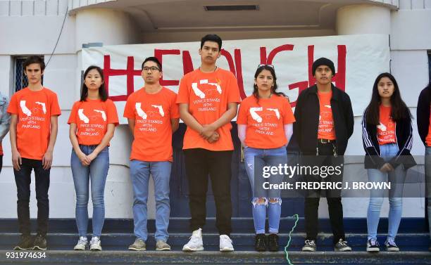 Students from Venice High School in Venice, California wear shirts in honour of the victims on March 14 where students joined others in a nationwide...