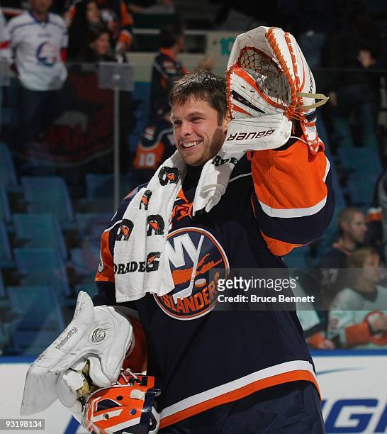 Martin Biron of the New York Islanders celebrates his teams victory against the Edmonton Oilers at Nassau Coliseum on November 2, 2009 in Uniondale,...