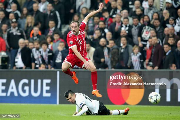 Franck Ribery of Bayern Muenchen is challenged by Gary Medel of Besiktas during the UEFA Champions League Round of 16 Second Leg match Besiktas and...