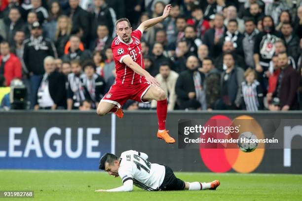 Franck Ribery of Bayern Muenchen is challenged by Gary Medel of Besiktas during the UEFA Champions League Round of 16 Second Leg match Besiktas and...