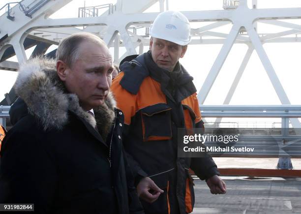 Russian President Vladimir Putin visits the construction site for the Crimean bridge which is being built to connect the Krasnodar region of Russia...