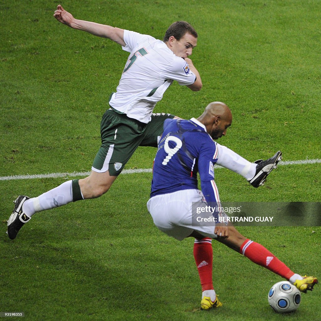 French forward Nicolas Anelka (bottom) v