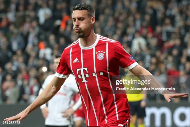 Sandro Wagner of Bayern Muenchen celebrates as he scores their third goal during the UEFA Champions League Round of 16 Second Leg match Besiktas and...