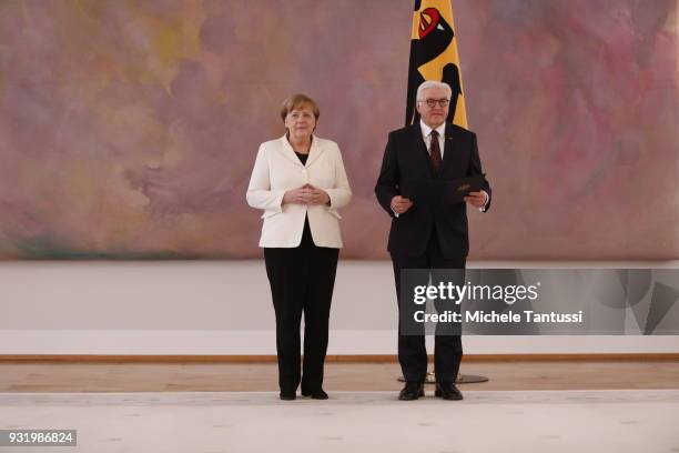 German Chancellor Angela Merkel takes her oath to serve her fourth term as chancellor from Germany State President Frank-Walter Steinmeier following...