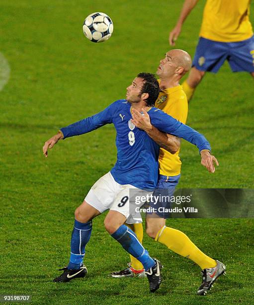 Giampaolo Pazzini of Italy and Daniel Majstorovic of Sweden vie for the ball during the international friendly match between Italy and Sweden at Dino...