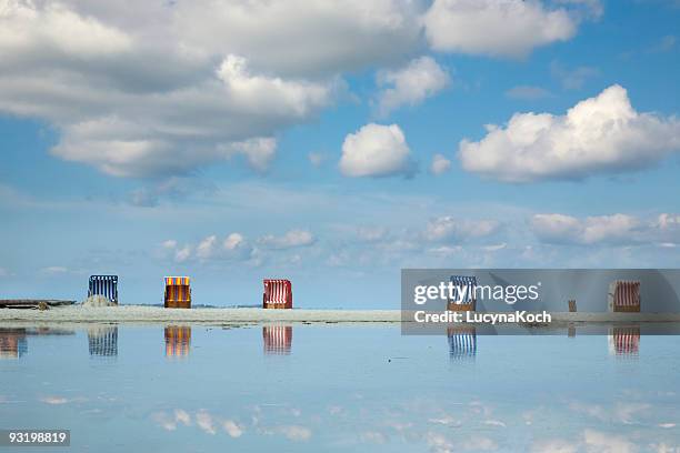 colorful beach chairs, norddorf beach - high tide stock pictures, royalty-free photos & images