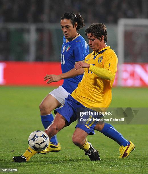 Mauro German Camoranesi of Italy battles for the ball against Dusan Djuric of Sweden during the International Friendly Match between Italy and Sweden...