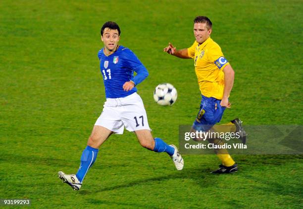 Giuseppe Rossi of Italy and Anders Svensson of Sweden in action during the international friendly match between Italy and Sweden at Dino Manuzzi...