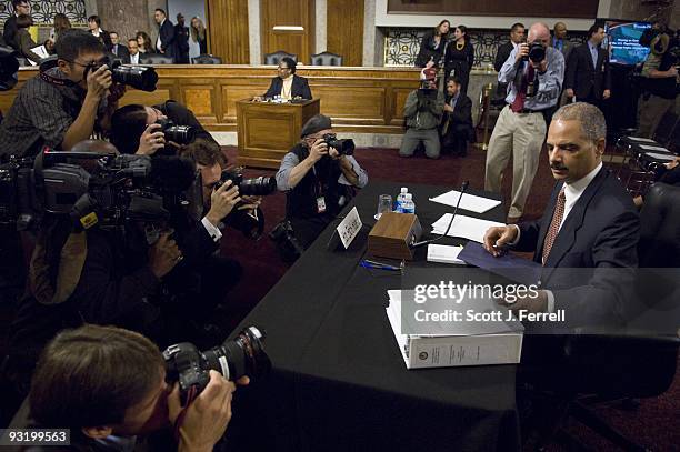 Attorney General Eric H. Holder Jr. Takes his seat to testify during the Senate Judiciary oversight hearing on the Justice Department. Holder is...