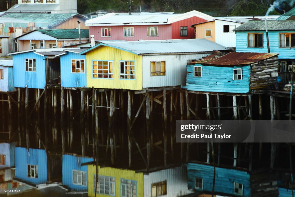 Colorful stilt houses over water