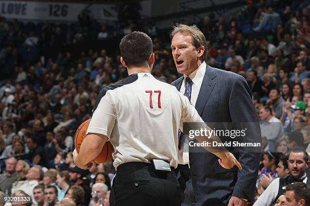 Head coach Kurt Rambis of the Minnesota Timberwolves talks with referee Kane Fitzgerald during the game against the Dallas Mavericks on November 13,...