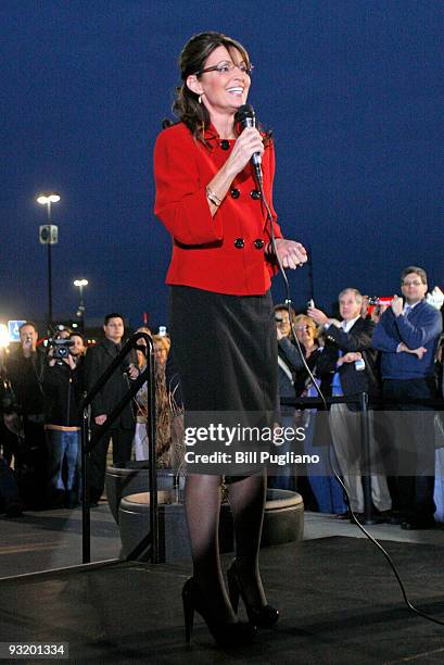 Former Republican vice presidential candidate and Alaska Governor Sarah Palin speaks briefly to a crowd of fans as she arrives for a book signing...