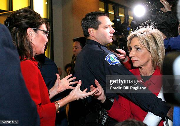 Former Republican vice presidential candidate and Alaska Governor Sarah Palin talks with NBC reporter Andrea Mitchell as she arrives for a book...