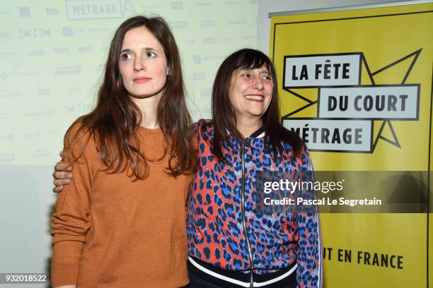 Celine Deveaux and Sylvie Pialat pose at "La Fete Du Cour Metrage" Photocall on March 14, 2018 in Paris, France.