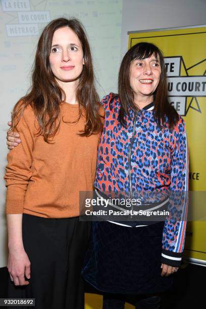 Celine Deveaux and Sylvie Pialat pose at "La Fete Du Cour Metrage" Photocall on March 14, 2018 in Paris, France.