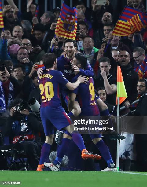 Lionel Messi of FC Barcelona celebrates after he scores the opening goal during the UEFA Champions League Round of 16 Second Leg match FC Barcelona...