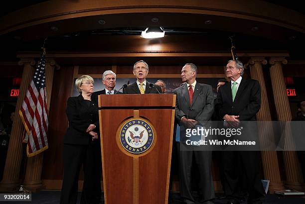 Senate Majority Leader Harry Reid announces that Senate Democrats unveiled their healthcare proposal while caucusing at the U.S. Capitol November 18,...