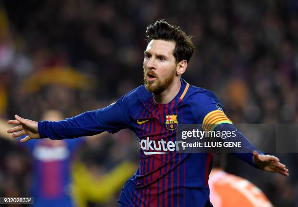 Barcelona's Argentinian forward Lionel Messi celebrates a goal during the UEFA Champions League round of sixteen second leg football match between FC...