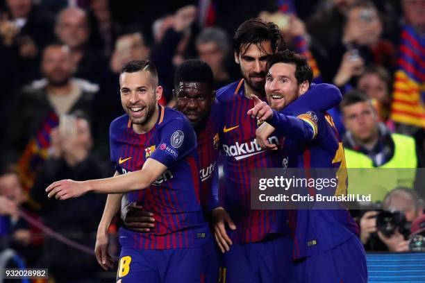 Lionel Messi of FC Barcelona celebrates after scoring his sides third goal with teammates Samuel Umtiti, Andre Gomes and Jordi Alba during the UEFA...