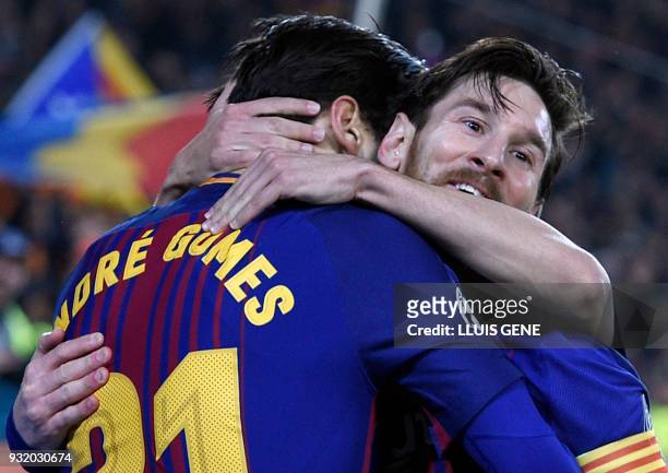 Barcelona's Argentinian forward Lionel Messi celebrates scoring his team's third goal during the UEFA Champions League round of sixteen second leg...