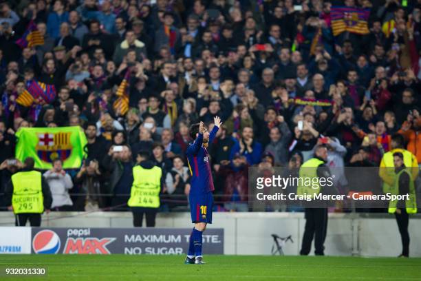 Barcelonas Lionel Messi celebrates scoring his side's third goal during the UEFA Champions League Round of 16 Second Leg match FC Barcelona and...