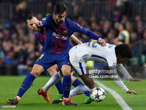 Barcelona's Portuguese midfielder Andre Gomes vies with Chelsea's Brazilian midfielder Willian during the UEFA Champions League round of sixteen...