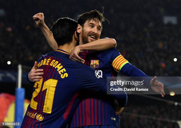 Lionel Messi of Barcelona celebrates with Andre Gomes as he scores their third goal during the UEFA Champions League Round of 16 Second Leg match FC...