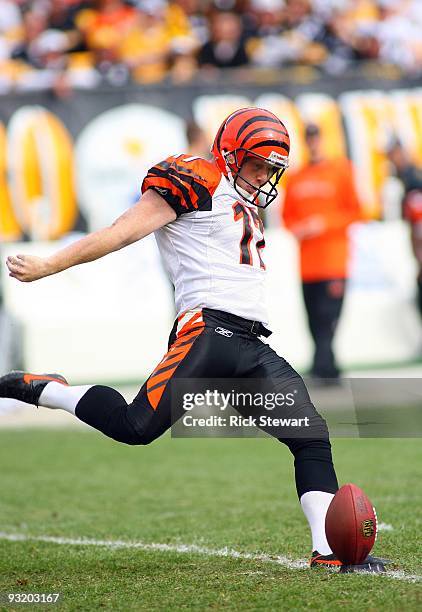 Place kicker Shayne Graham of the Cincinnati Bengals moves to kick the ball on the kick-off during their game against the Pittsburgh Steelers at...