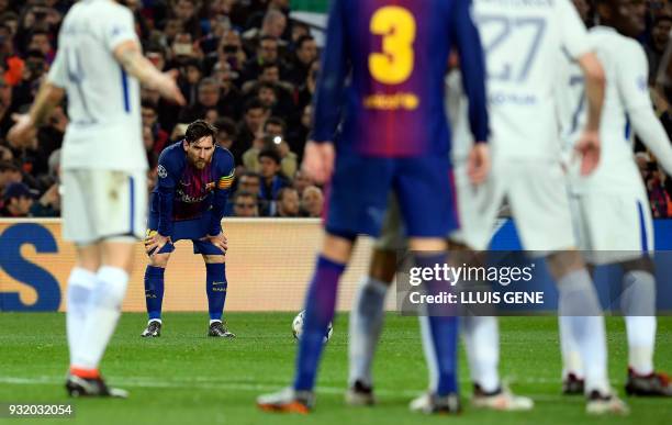 Barcelona's Argentinian forward Lionel Messi prepares to shoot during the UEFA Champions League round of sixteen second leg football match between FC...