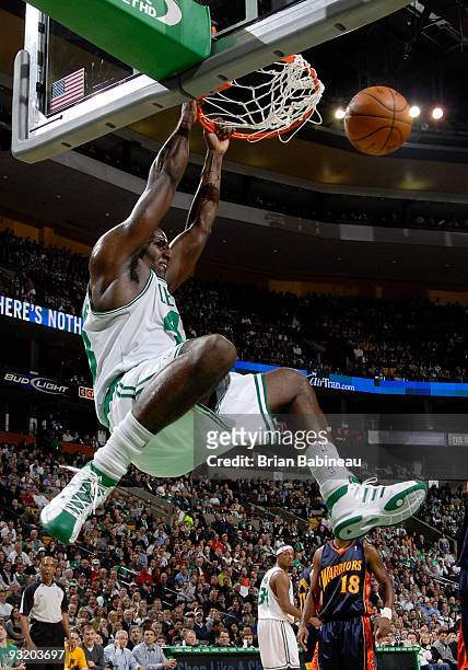Kendrick Perkins of the Boston Celtics dunks the ball during the game against the Golden State Warriors on November 18, 2009 at the TD Garden in...