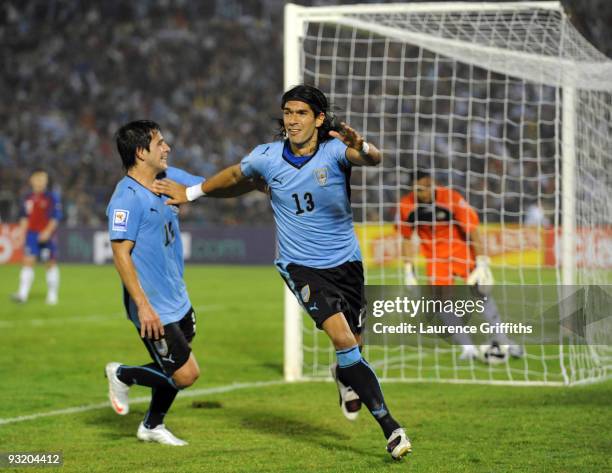 Sebastian Abreu of Uruguay celebrates his goal during the 2010 FIFA World Cup Play Off Second Leg Match between Uruguay and Costa Rica at The Estadio...