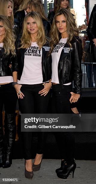 Models Heidi Klum and Alessandra Ambrosio take over Military Island, Times Square on November 18, 2009 in New York City.