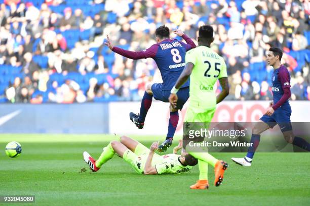 Thiago Motta of PSG lands with his studs on Romain Thomas of Angers and receives a red card during the Ligue 1 match between Paris Saint Germain and...
