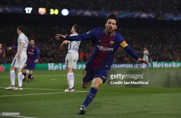 Lionel Messi of FC Barcelona celebrates after he scores his team's third goal during the UEFA Champions League Round of 16 Second Leg match FC...