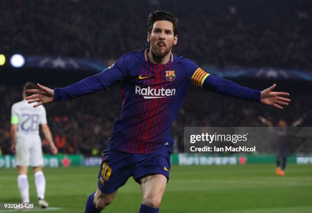 Lionel Messi of FC Barcelona celebrates after he scores his team's third goal during the UEFA Champions League Round of 16 Second Leg match FC...