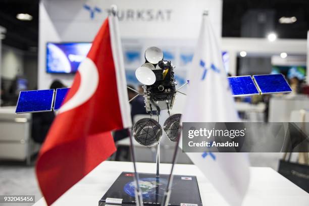 Model satellite is on display at the booth for Turkish satellite makers at the Satellite 2018 Exhibition in Washington, USA on March 14, 2018.