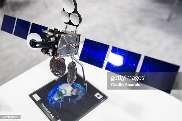 Model satellite is on display at the booth for Turkish satellite makers at the Satellite 2018 Exhibition in Washington, USA on March 14, 2018.