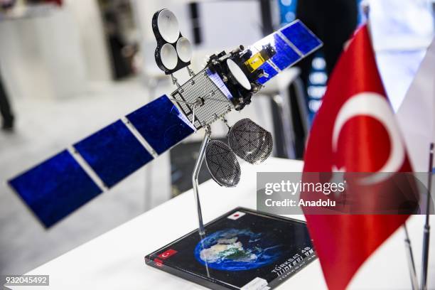 Model satellite is on display at the booth for Turkish satellite makers at the Satellite 2018 Exhibition in Washington, USA on March 14, 2018.