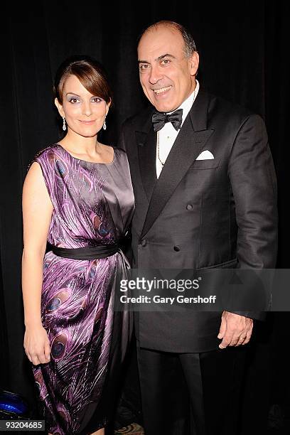 Event master of ceremonies, actress Tina Fey , and Public Service Award honoree, Chairman & CEO, The Coca Cola Company, Muhtar Kent, attend the 56th...