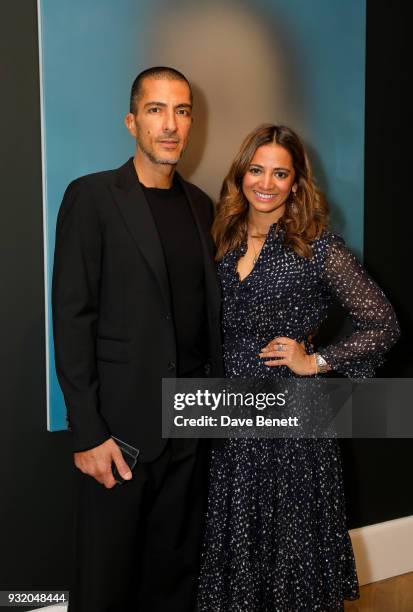 Wissam Al Mana and Katy Wickremesinghe attend the private view and wine tasting event of Miaz Brothers: Anonymous at Lazinc on March 14, 2018 in...