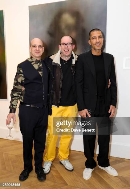 Steve Lazarides, Ben Eine and Wissam Al Mana attend the private view and wine tasting event of Miaz Brothers: Anonymous at Lazinc on March 14, 2018...