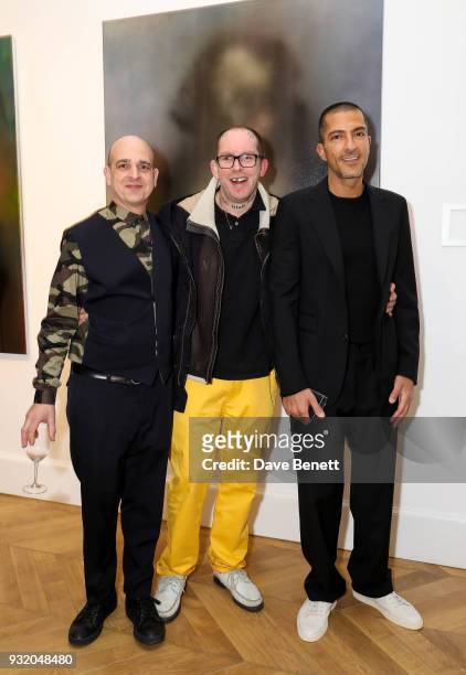 Steve Lazarides, Ben Eine and Wissam Al Mana attend the private view and wine tasting event of Miaz Brothers: Anonymous at Lazinc on March 14, 2018...