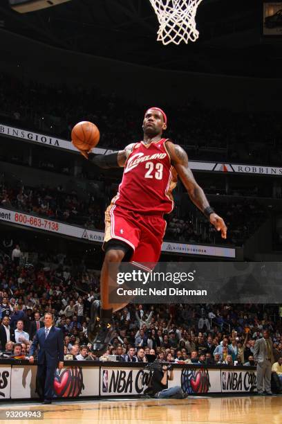 LeBron James of the Cleveland Cavaliers dunks against the Washington Wizards at the Verizon Center during the game on November 18, 2009 in...