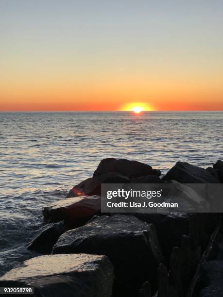 sunset beach in cape may, nj - delaware bay stock-fotos und bilder