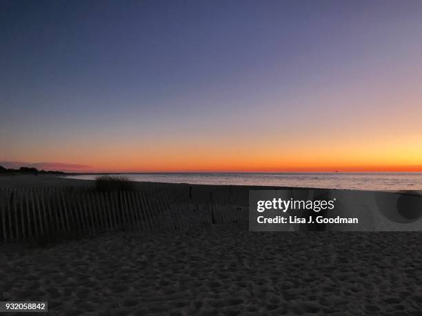 sunset beach in cape may, nj - delaware bay stock-fotos und bilder